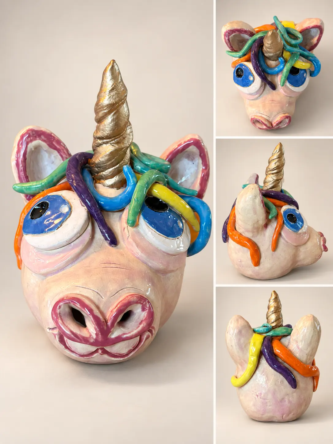 Tête de licorne en céramique rose, coiffée de mèches multicolores et d'une corne dorée.
